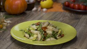 Conchiglie salad with avocado and marinated peppers