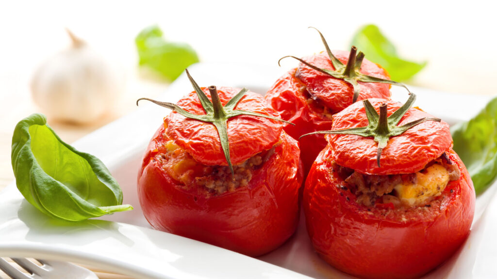 Stuffed tomatoes, cooked and raw